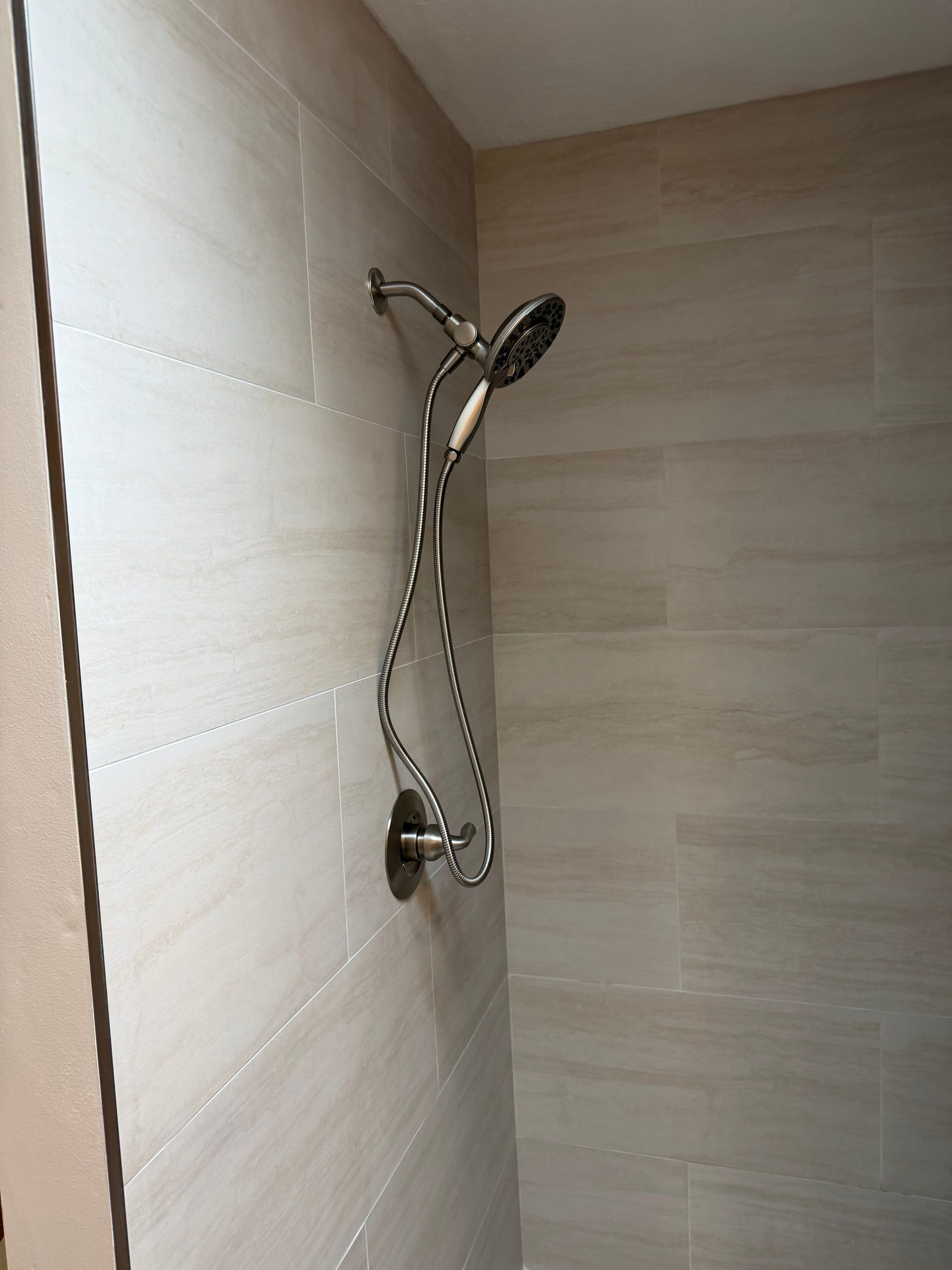 Recently completed bathroom remodel by Plumbing Detectives LLC